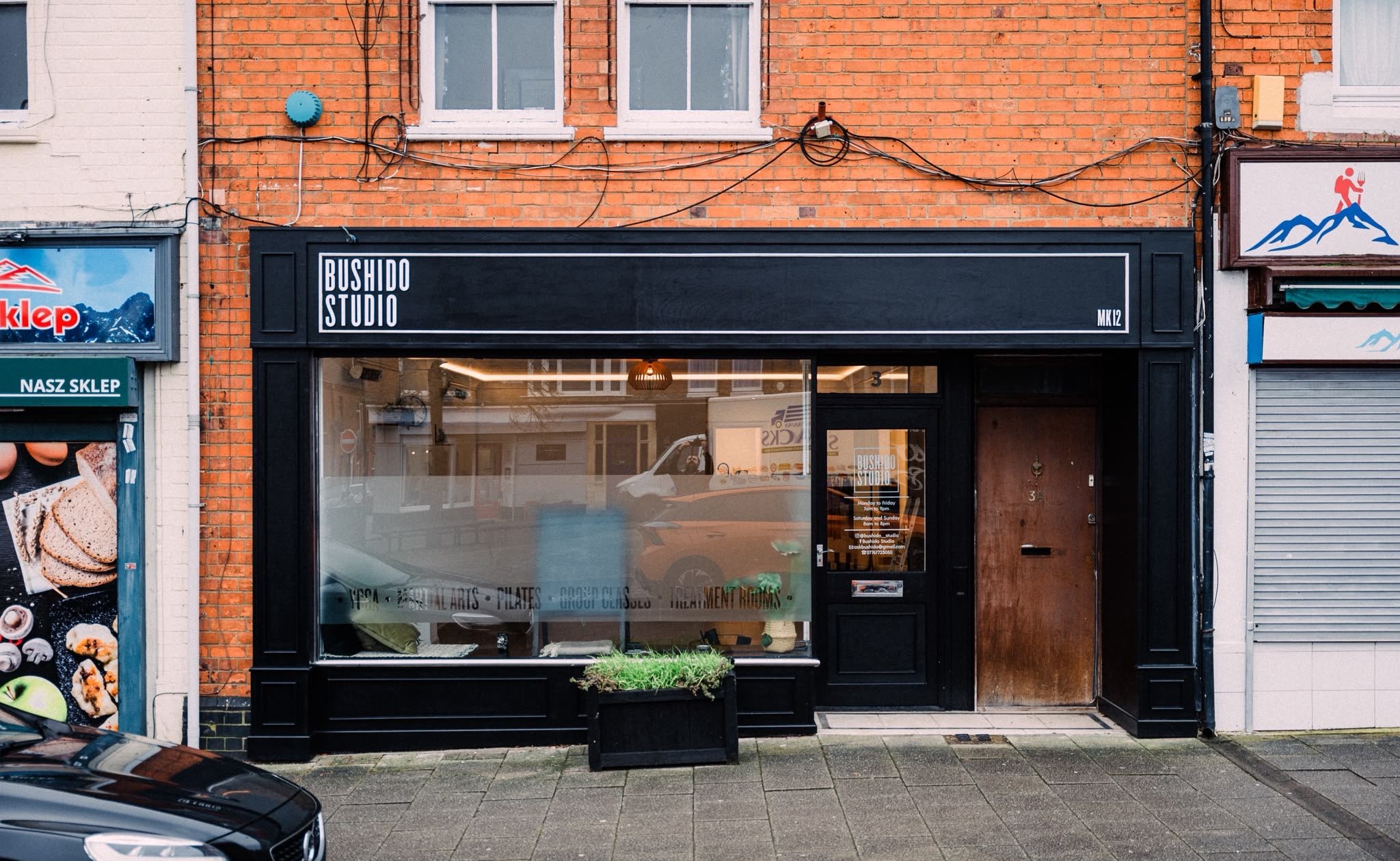 Bushido Studio’s black shopfront at 3 Radcliffe Street, Wolverton